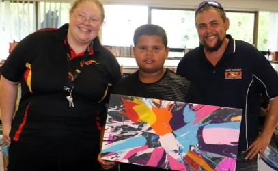 Jabiru art competition winners smiling at the camera