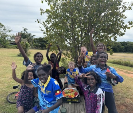 Smiling children having a break at football training