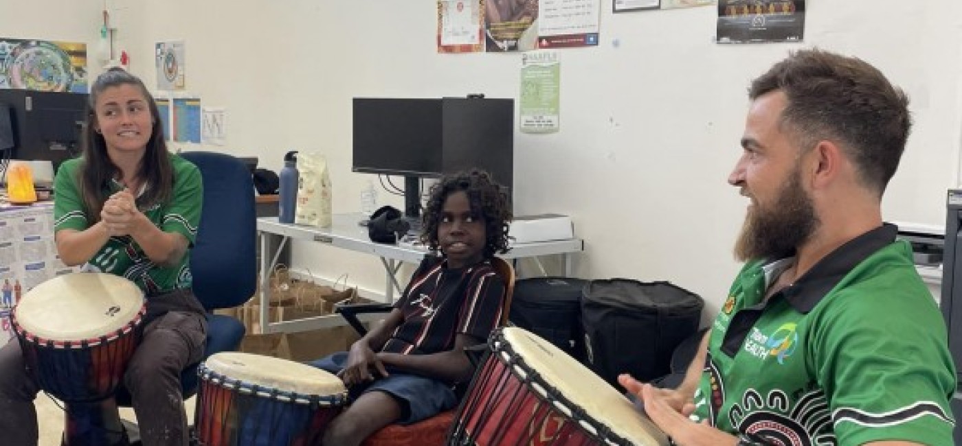 Youth Sport and Recreation team playing drums
