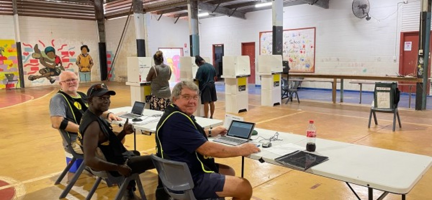 Happy people manning the polling booths