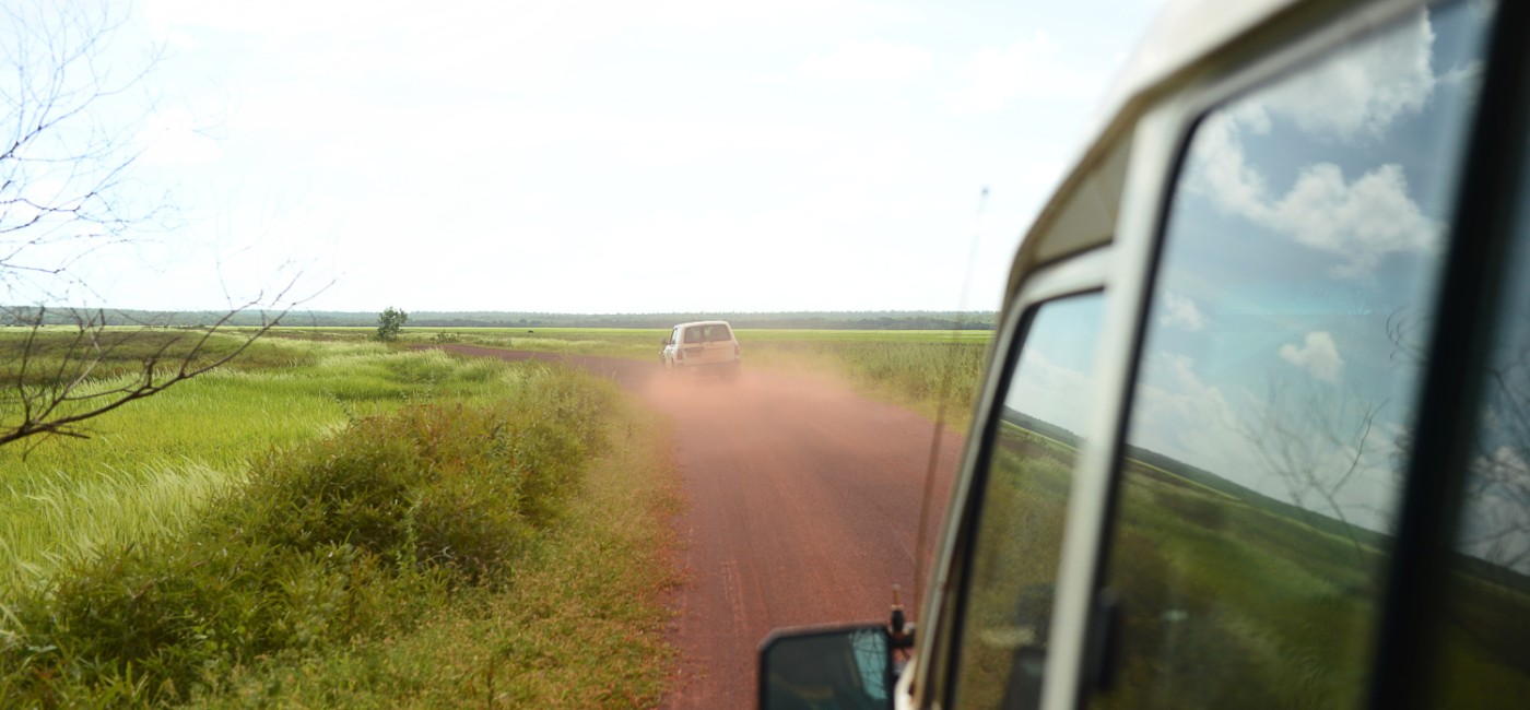 cars on dirt road