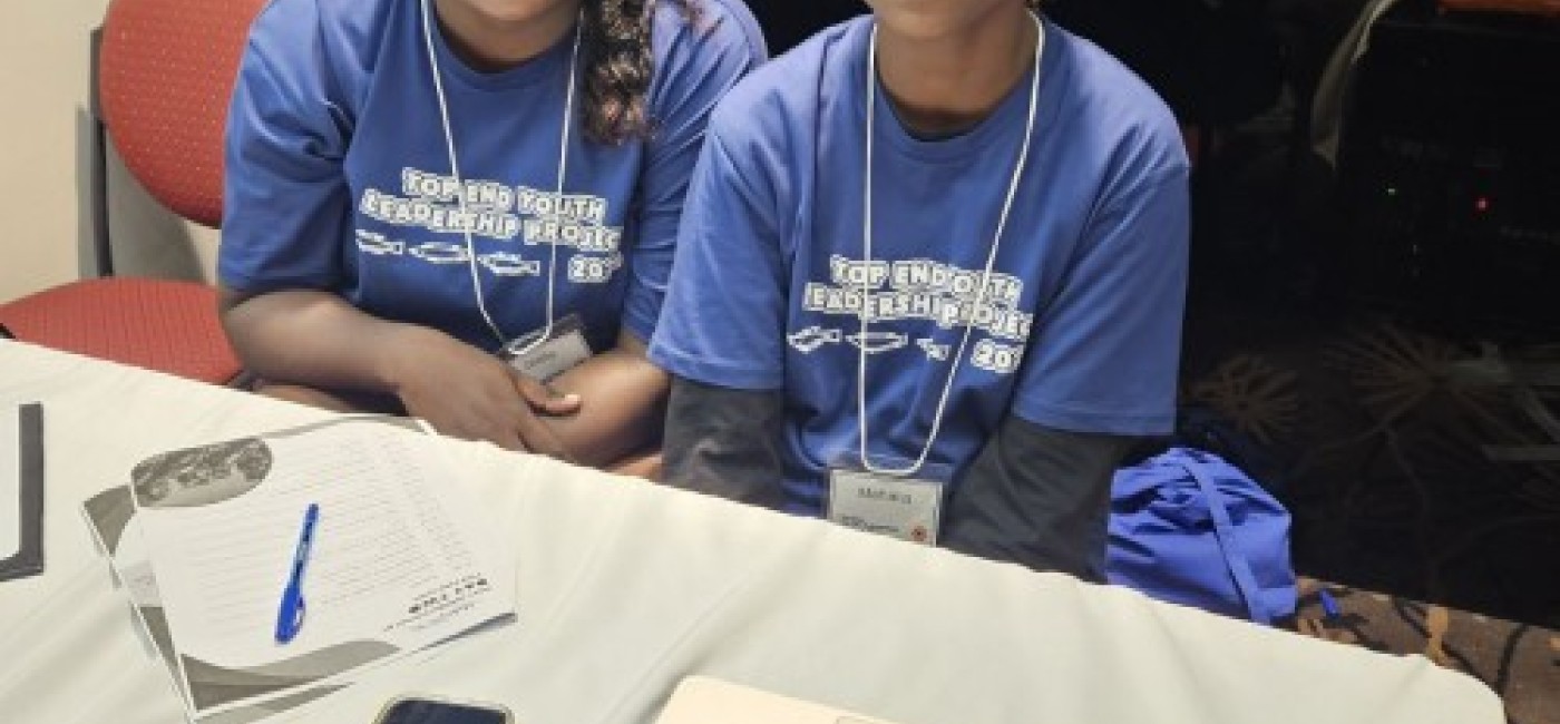 Two smiling girls taking part in a leadership course