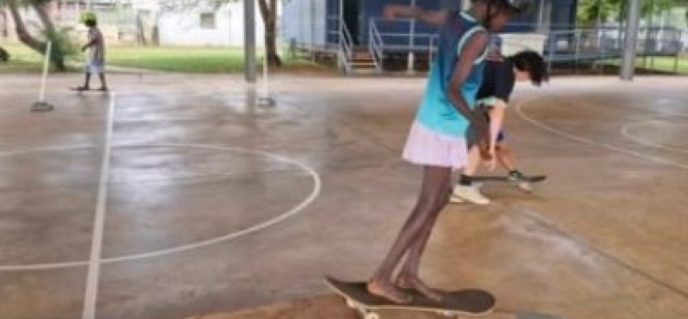 Children practicing skateboarding in Gunbalanya
