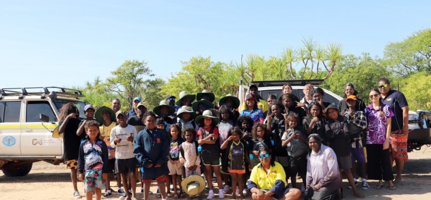 Everyone gathered around the cars at Warruwi Youth camp