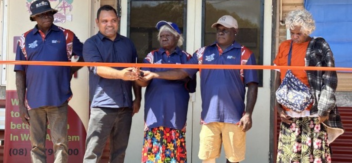 People cutting the ribbon at the opening of the Warruwi Health Clinic